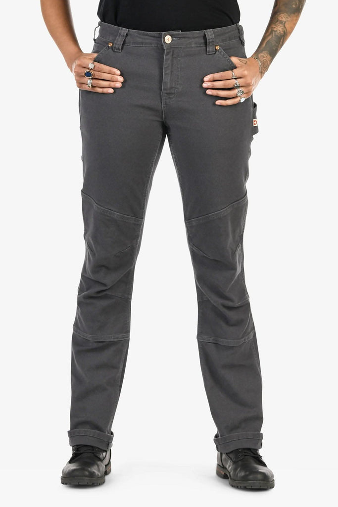 GO TO™ Stretch Canvas Pant in Cement Grey by Dovetail Workwear shown on a woman wearing a black t-shirt, featuring articulated knees, reinforced knee, and a straight leg silhouette