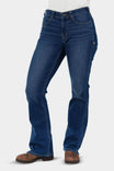 John Deere X Dovetail Workwear Into Town Bootcut Jeans in Classic Indigo Blue worn by a woman, shown from the front with brown boots, featuring a mid-rise waist and bootcut silhouette