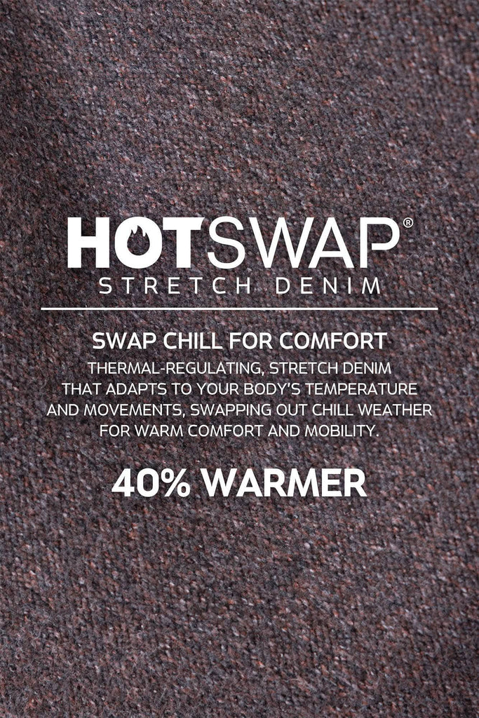 Close-up of black HotSwap™ Thermal Denim fabric from Dovetail Workwear, highlighting the thermal-regulating texture that is 40% warmer than standard denim