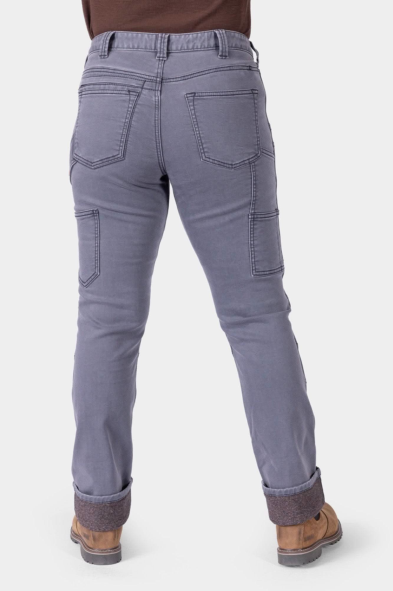 Back view of grey thermal denim Britt Utility HOTSWAP™ Pants featuring reinforced seams and multiple utility pockets for durable cold weather workwear.
