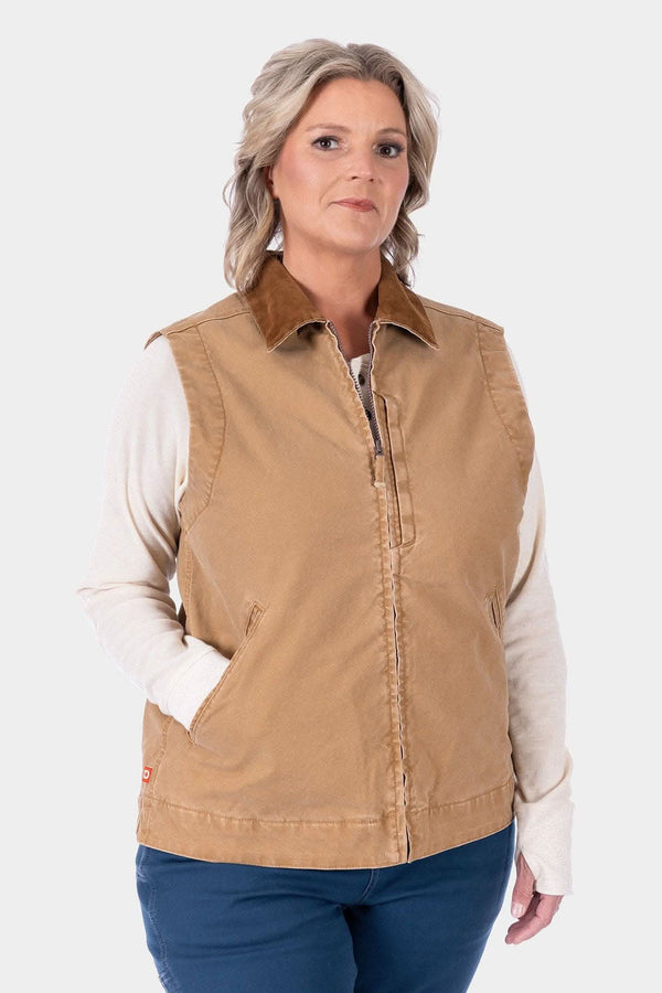 Dovetail Workwear Old School Trucker Vest in Vintage Brown worn by a woman over a cream long-sleeve shirt, featuring a corduroy collar and zip front closure
